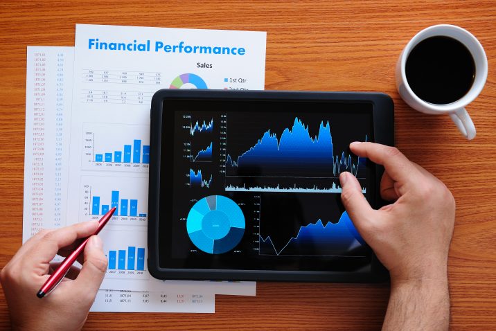 Man analyzing financial chart with tablet PC.Please see some similar pictures from my portfolio: