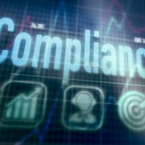 Compliance concept on a blue dot matrix computer display.