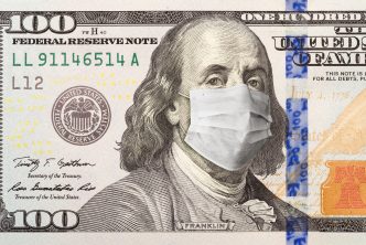 One Hundred Dollar Bill With Medical Face Mask on George Washington.