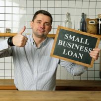 Small business loan in the businessman hands.