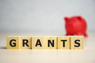 the word of GRANTS on building blocks concept